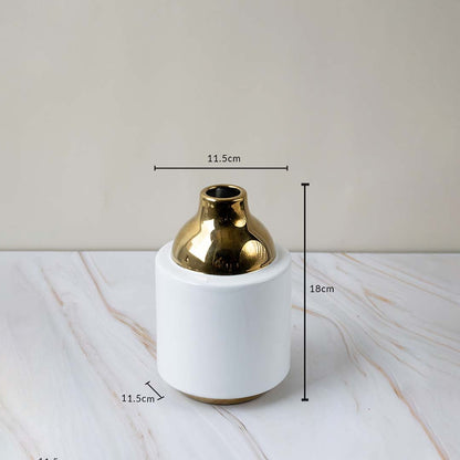White ceramic vase with gold top on a white background showing dimensions of 18 cm height 11.5 cm width and 11.5 cm depth for accurate placement.