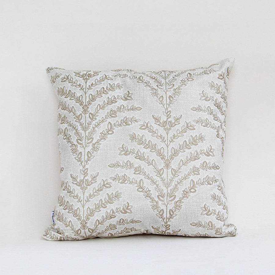 White cotton cushion cover with beige botanical leaf print for sofa bedroom seating and elegant home decor styling.