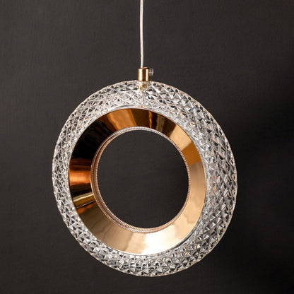 Detailed closeup of gold crystal pendant light frame showing luxury finish for home and office interiors.