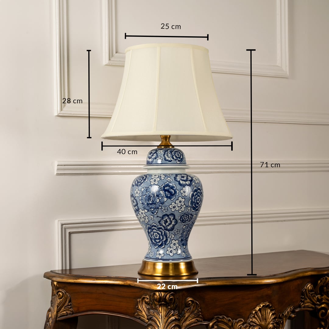 Blue and white ceramic table lamp with fabric shade measuring 61 cm height and 40 cm width for classic interiors.