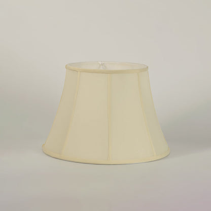 Soft cream fabric lampshade part of table lamp creating a cozy and inviting glow that enhances the ambience of modern and classic interiors.