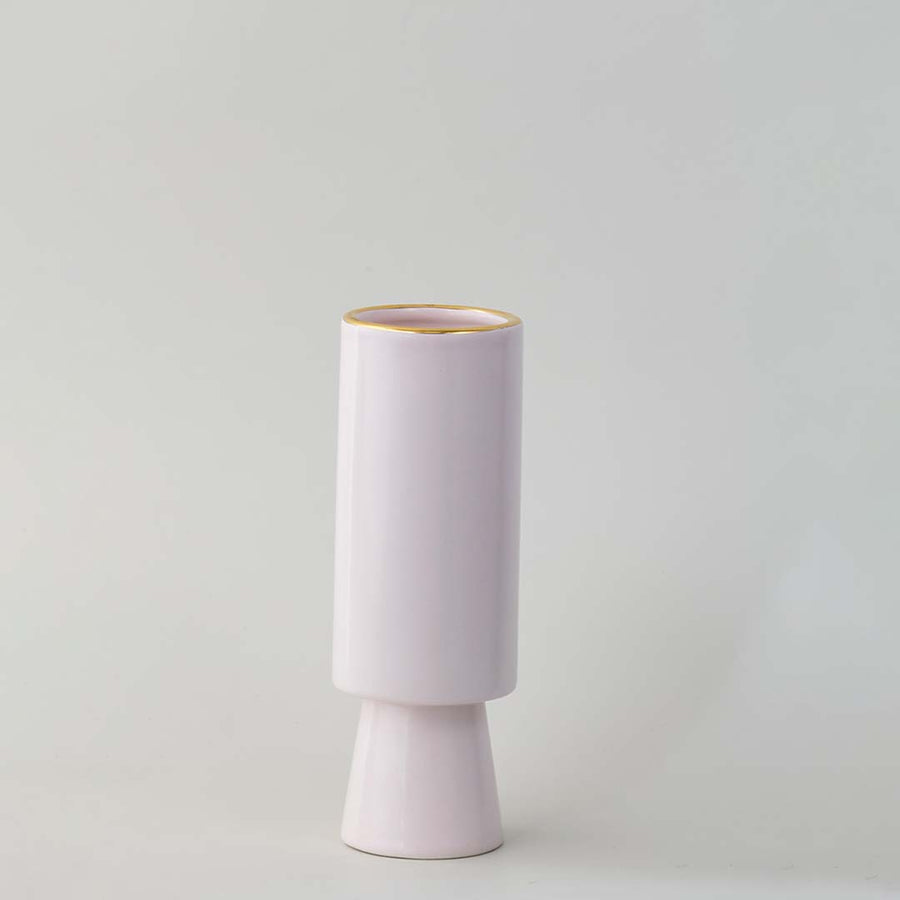 Pastel pink tiered ceramic cylinder vase featuring a delicate metallic gold rim accent on white background for chic styling.