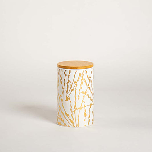 Elegant ceramic jar with golden botanical artwork and wooden lid presented on a soft white background for a simple and modern product view.