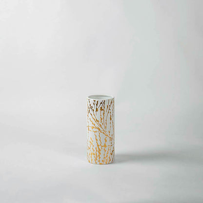 White ceramic decorative vase with gold abstract detailing for tabletop styling and elegant modern home decor.