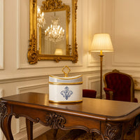 White ceramic jar with blue architectural artwork in a front view perfect for classic décor styling and luxury room placement.