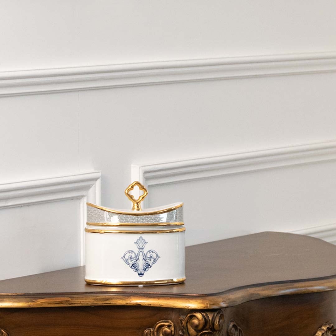 White rectangular ceramic jar with blue artwork in a front view ideal for elegant décor styling and stylish tabletop placement.