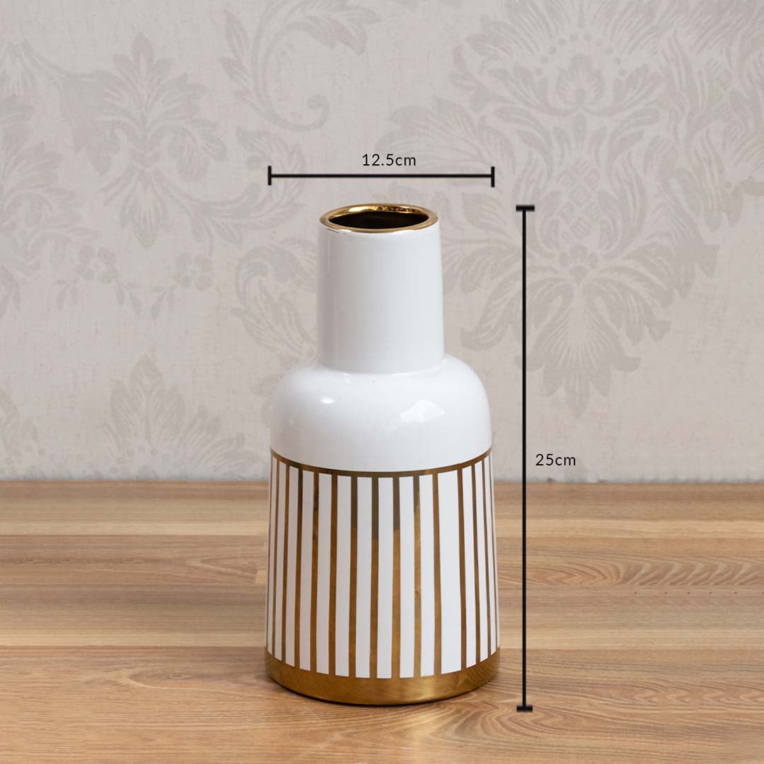 White ceramic decorative vase with gold ribbed metal base for tabletop shelf or console display showing product dimensions.