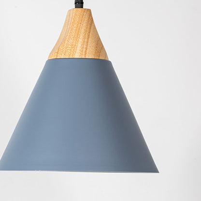 Closeup of grey pendant light with wooden top showing smooth matte finish for modern home and dining lighting decor.