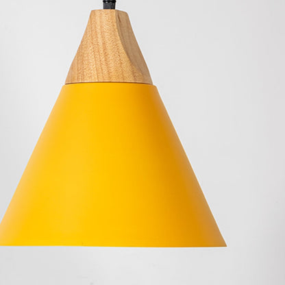 Closeup of yellow pendant ceiling light with wooden top showing matte finish for kitchen dining and cafe lighting decor.