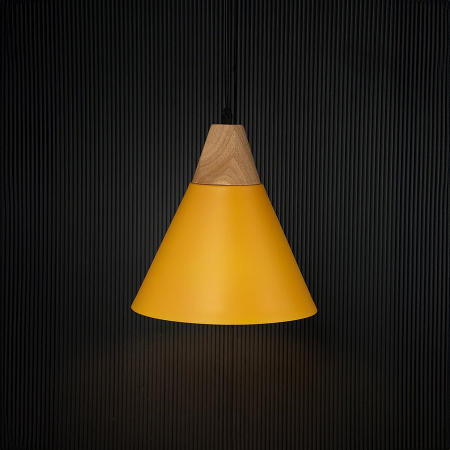Yellow pendant ceiling light with wood detail illuminated on back background for cafe dining and home interior lighting.