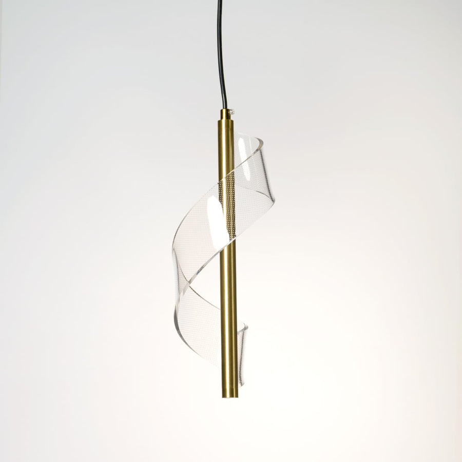 Closeup of gold spiral pendant lamp showing detailed metal texture and refined craftsmanship for luxury home lighting.