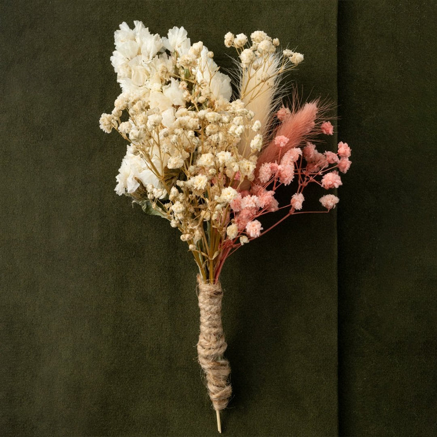 Rustic dried flower boutonniere with natural preserved blooms and jute wrap ideal for groom and groomsmen wedding wear.