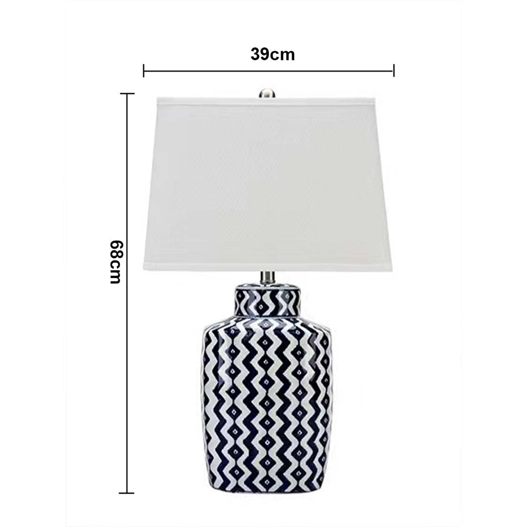 White shade blue patterned table lamp with size 53cm height and 30cm width with light off on white background for contemporary décor.