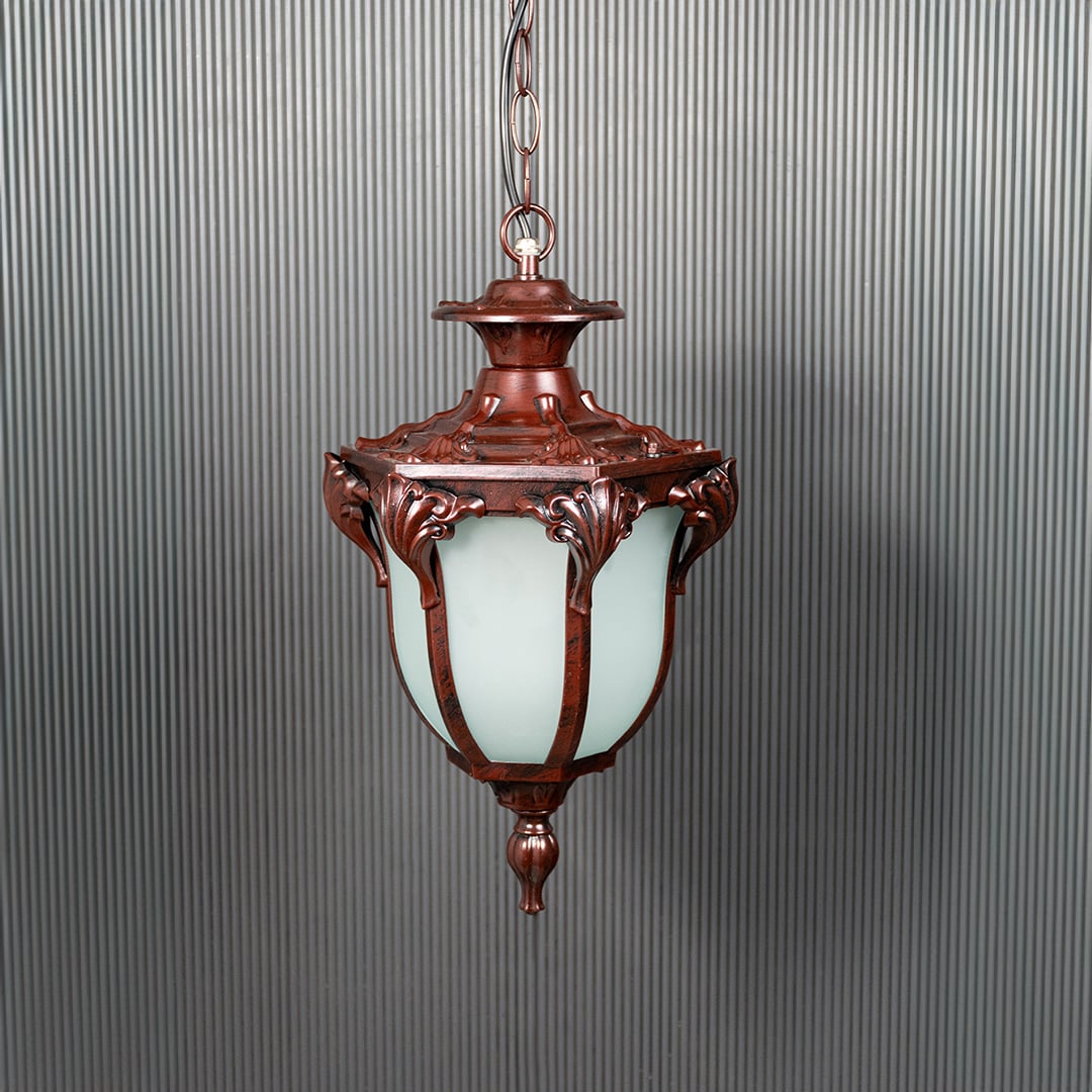 Brown vintage hanging lantern with frosted glass shown switched off on black background highlighting elegant design.