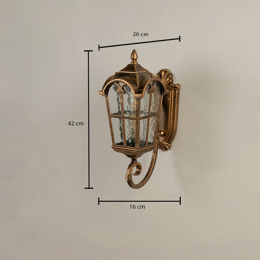 Gold metal outdoor wall lantern with frosted glass showing size 42 cm height 26 cm width and 16 cm depth for accurate exterior fitting.