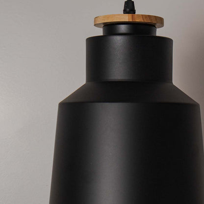 Sleek matte black metal pendant lamp with wooden top detail perfect for dining room kitchen or bedroom lighting.