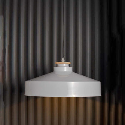 Modern white dome pendant lamp with wide metal shade and wooden detail glowing warmly on black background for decor.