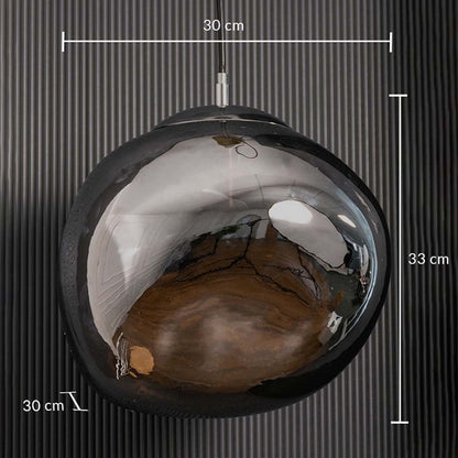 A smoked glass pendant light with clear size details measuring 33 cm height and 30 cm width and 30 cm depth to guide accurate placement.
