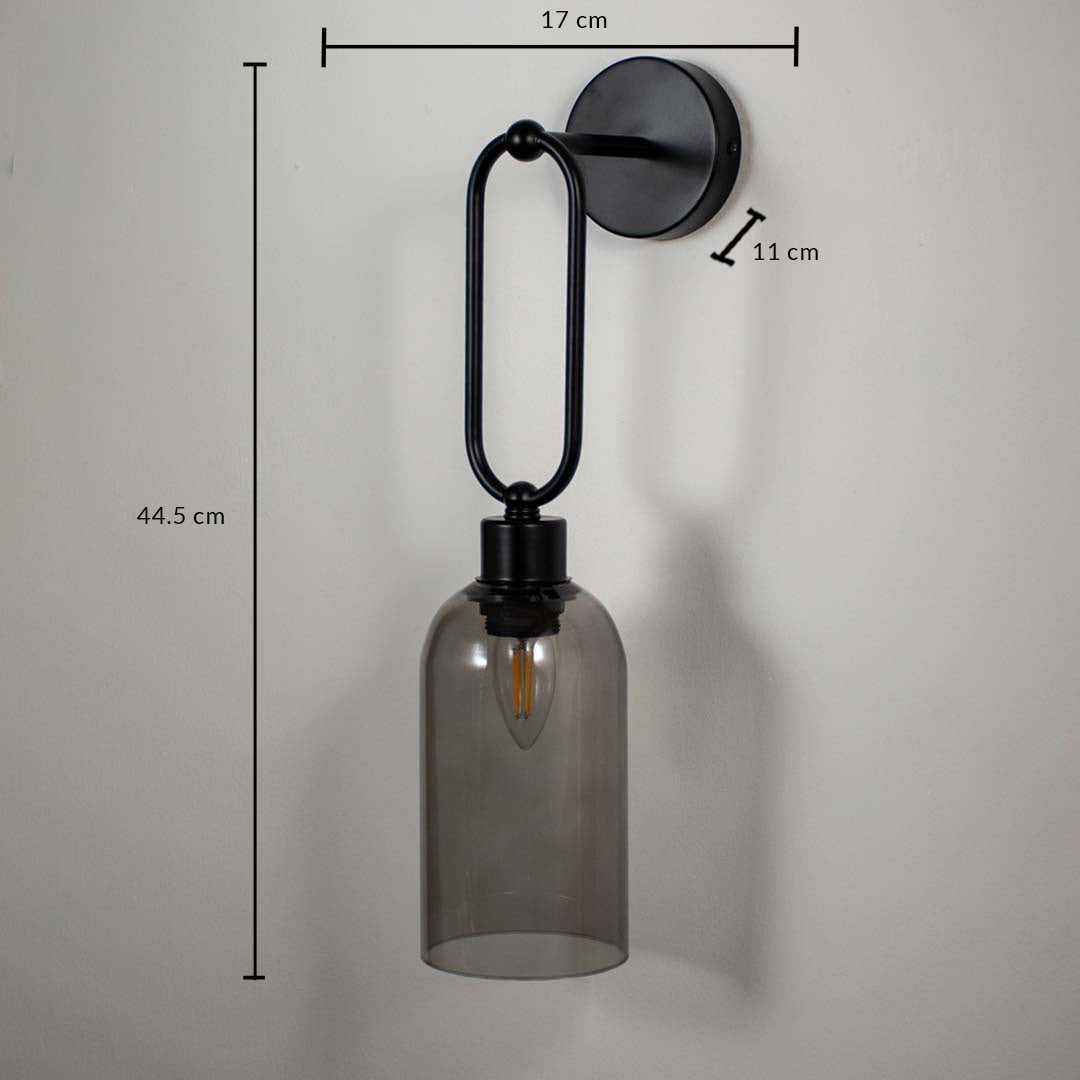 Modern wall mounted glass light with black metal arm displaying 40 cm height 12 cm width and 18 cm projection for interior lighting use.