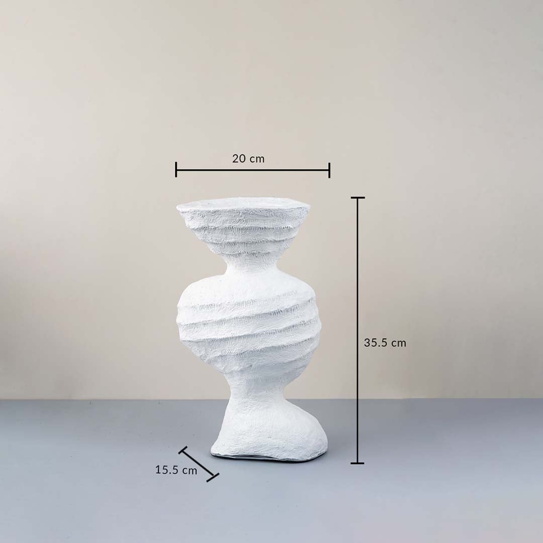 White ceramic sculptural vase with textured design measured for stylish modern table decor and home styling.