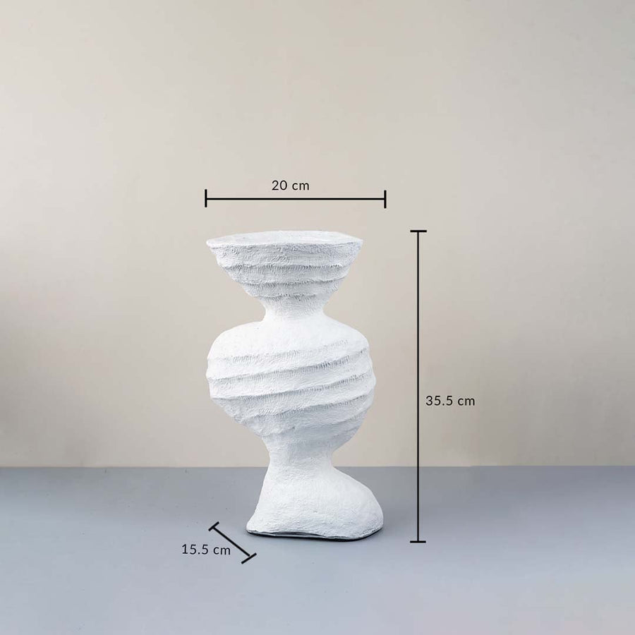 White ceramic sculptural vase with textured design measured for stylish modern table decor and home styling.