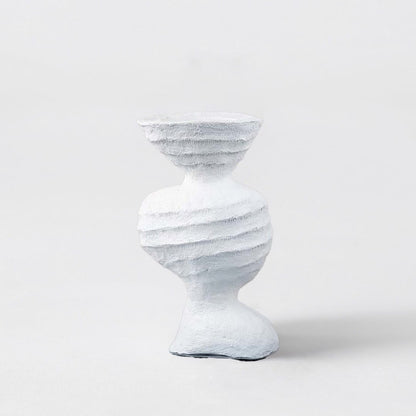 Sculptural white ceramic vase with artistic textured design modern decorative accent for table and shelf decor.
