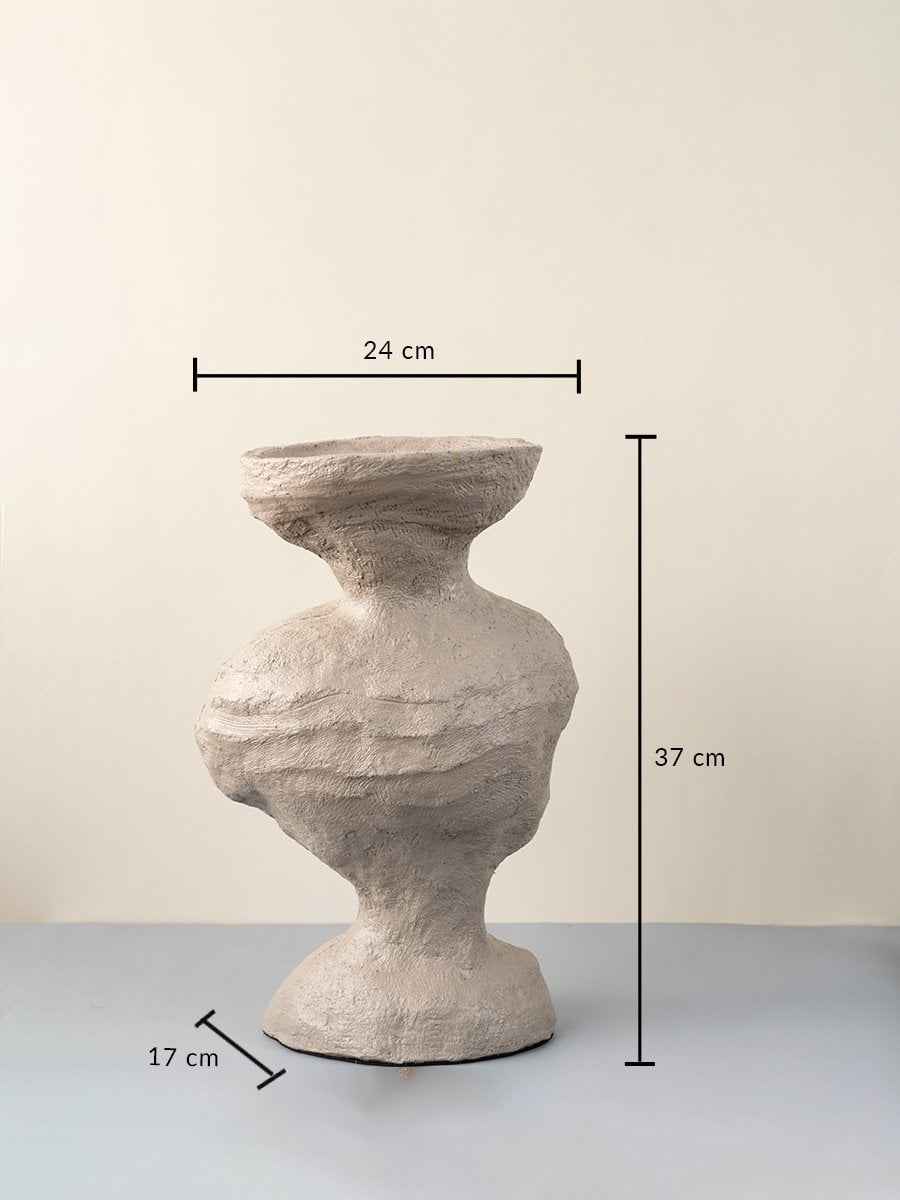 Beige ceramic vase with sculptural texture 37 cm height 24 cm width and 17 cm depth ideal for table decor.
