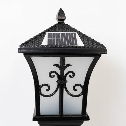 Closeup of black solar outdoor gate light with textured top panel for modern exterior decor styling.