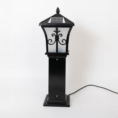 Black solar outdoor gate light with decorative glass panels for elegant exterior decor use.