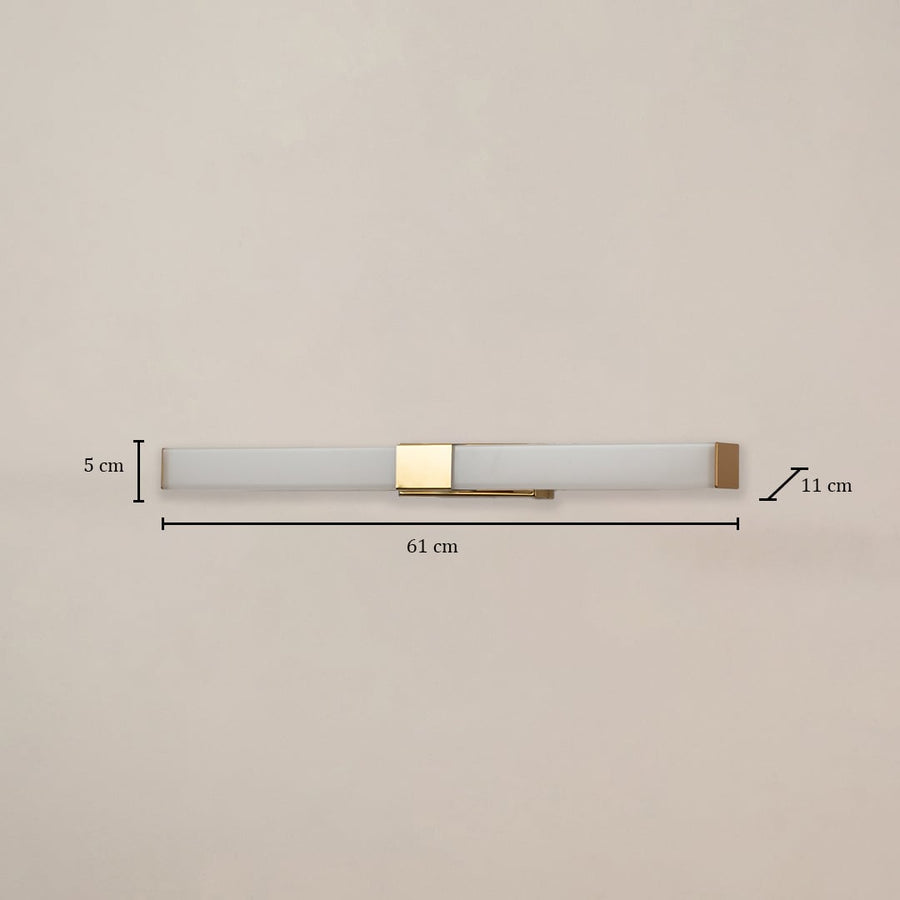 White and gold picture light measuring 61 cm width and 11 cm depth shown on white background for accurate wall lighting planning.