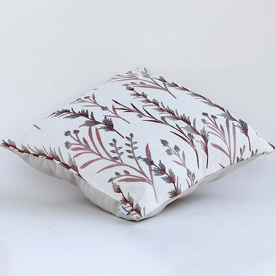 White cotton cushion cover with maroon and grey botanical design providing a refined natural accent for modern home décor with a durable soft and skin friendly fabric feel.