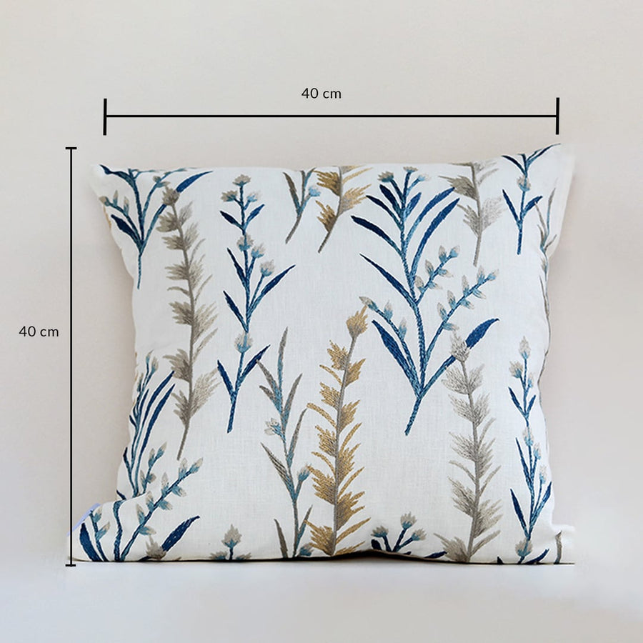 Botanical embroidered cushion in blue and gold displayed on a white background showing clear dimensions of 40 cm height and 40 cm width for accurate sizing.