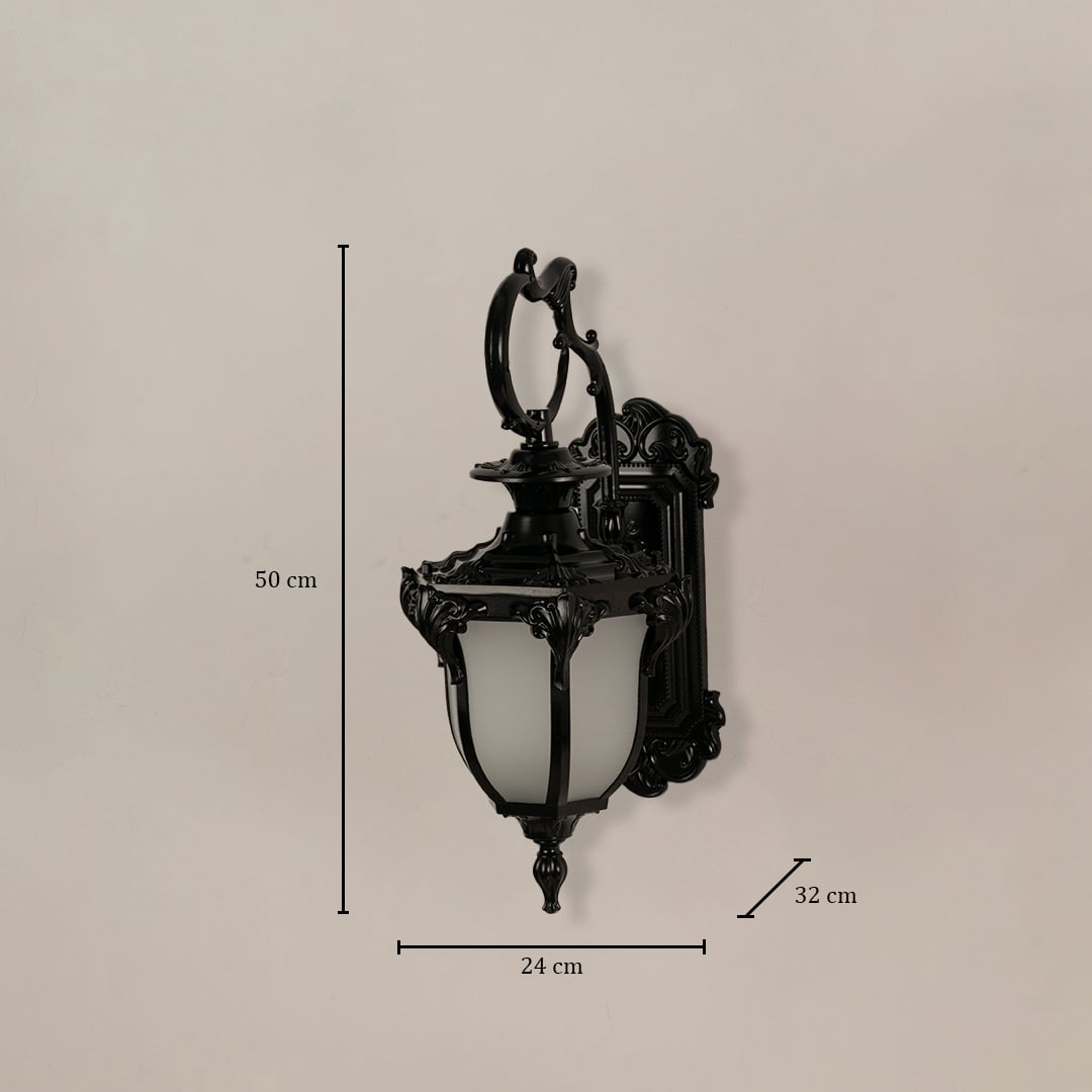 Black metal lantern with frosted glass measuring 50 cm height 24 cm width and 32 cm depth shown for outdoor placement.
