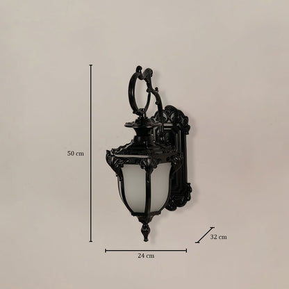 Black metal lantern with frosted glass measuring 50 cm height 24 cm width and 32 cm depth shown for outdoor placement.