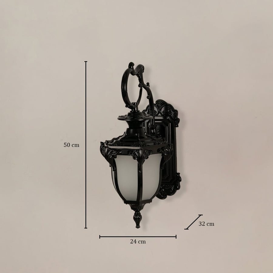 Black metal lantern with frosted glass measuring 50 cm height 24 cm width and 32 cm depth shown for outdoor placement.