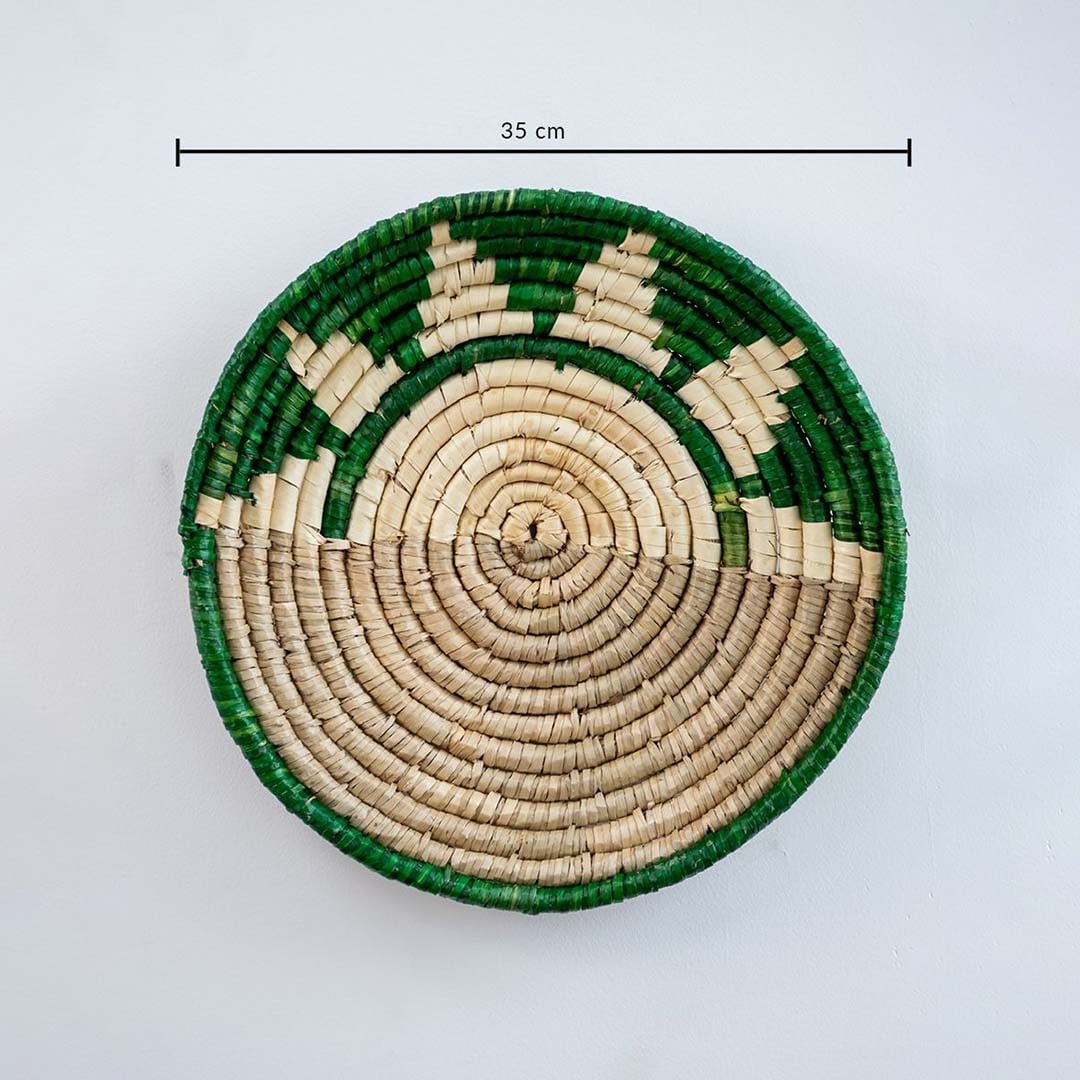 Handwoven round wall basket with green border showing 30 cm diameter suitable for accurate interior wall Decor placement reference.