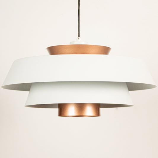 White and copper metal pendant light closeup showcasing layered design and premium finish.