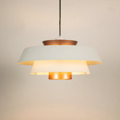 White and copper metal pendant light glowing warmly on white background creating stylish ambience for home office cafe and more spaces.