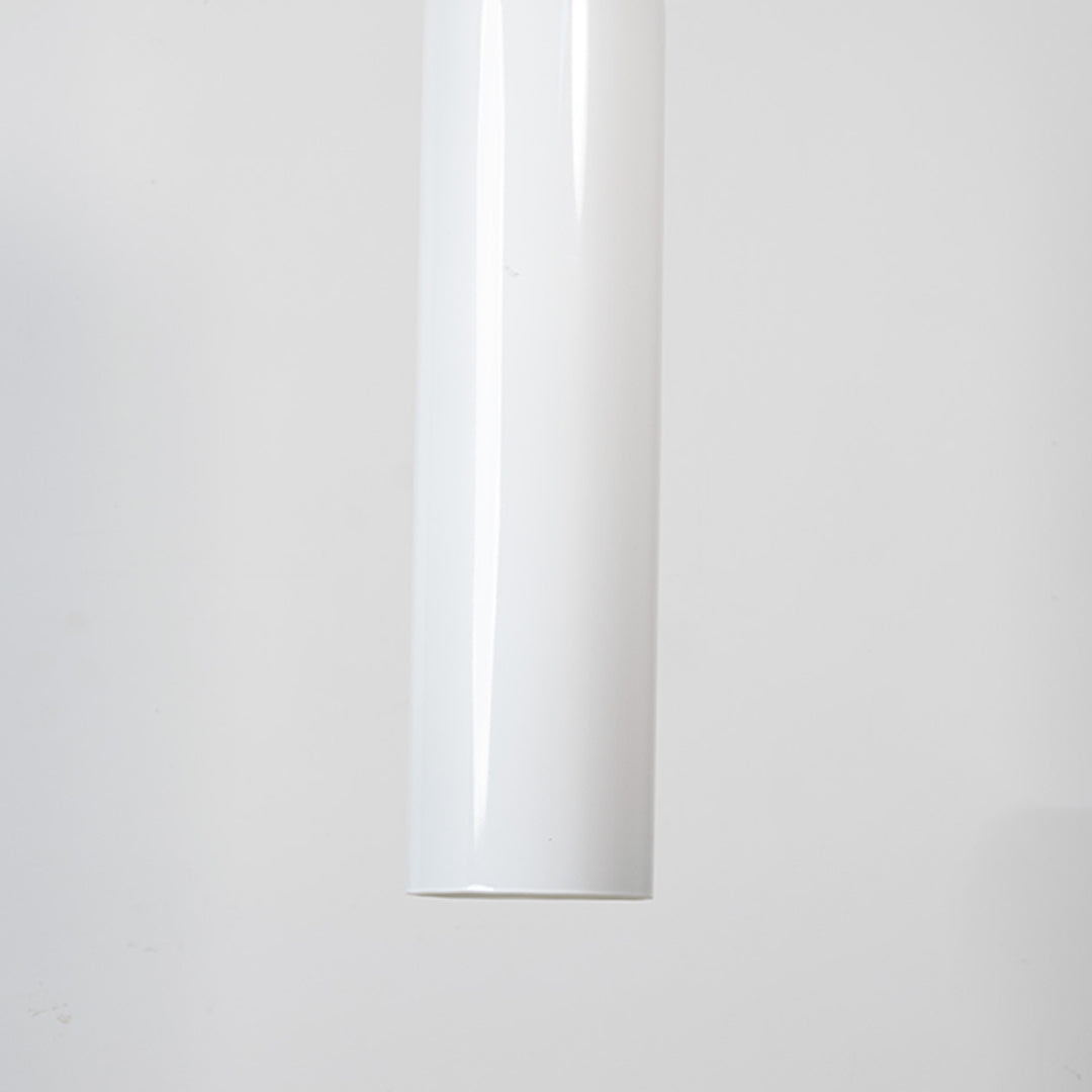 White metal pendant light with sleek cylindrical design for modern kitchen ceiling placement.