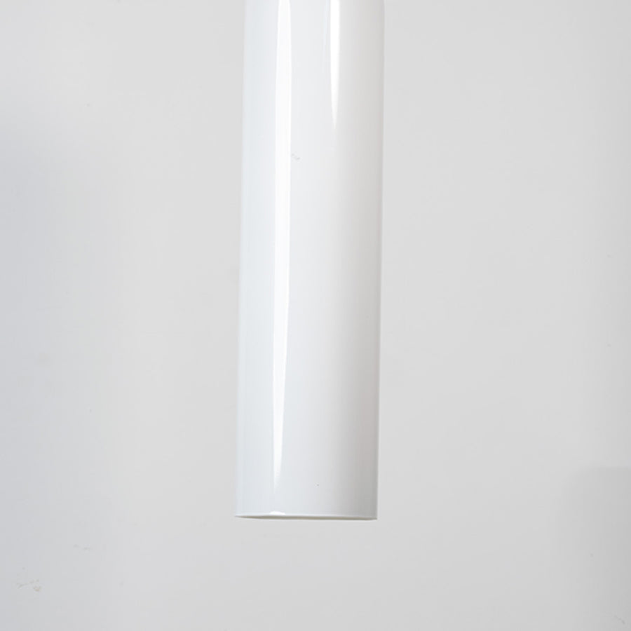 White metal pendant light with sleek cylindrical design for modern kitchen ceiling placement.
