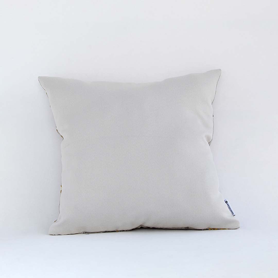 Plain off white cushion cover back view shown on white background highlighting smooth fabric finish for sofa or bed styling.
