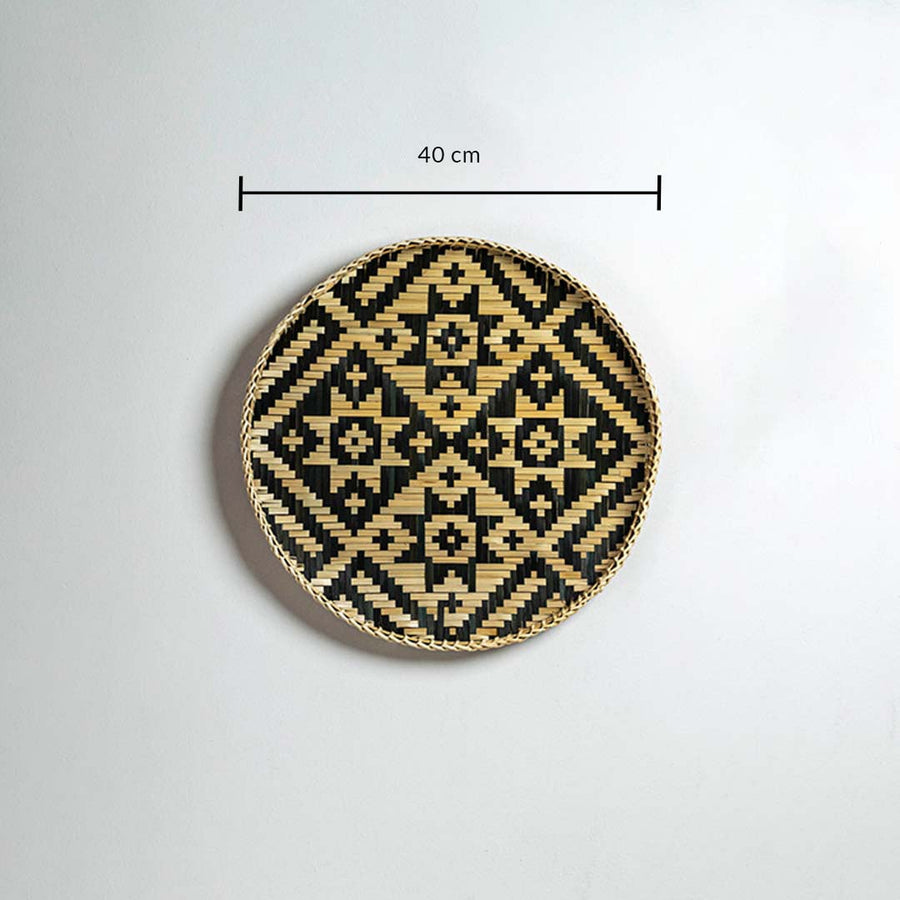 Round bamboo wall decor plate with geometric weave pattern shown with 40 cm diameter for accurate size reference.