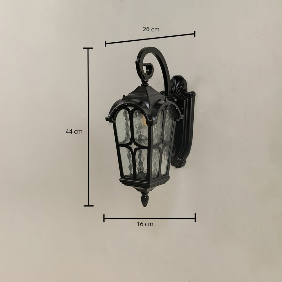 Outdoor lantern showing dimensions of 44 cm height 26 cm width and 16 cm depth with clear textured glass.