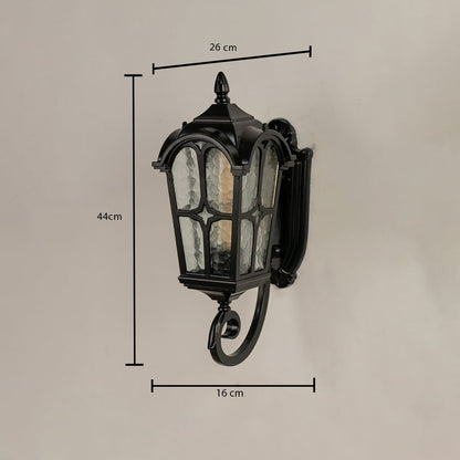 Outdoor lantern showing dimensions of 44 cm height 26 cm width and 16 cm depth with curved metal design.