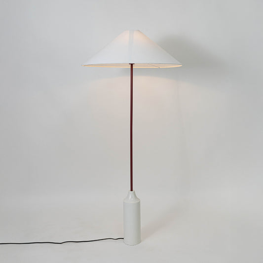 White metal table lamp with white fabric shade for bedroom bedside table and modern home decor on white background.