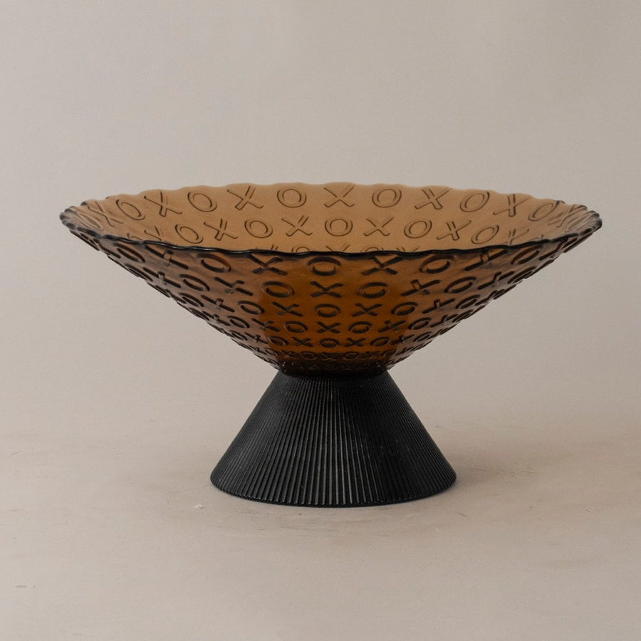 Amber glass bowl with elegant XO embossed design and black ribbed base showcased on clean white background for product focus.