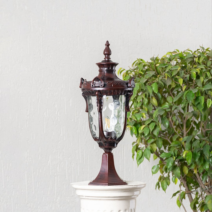 Elegant brown pillar lamp placed on stone pillar with light off enhancing villa entrance and stylish home garden decor.