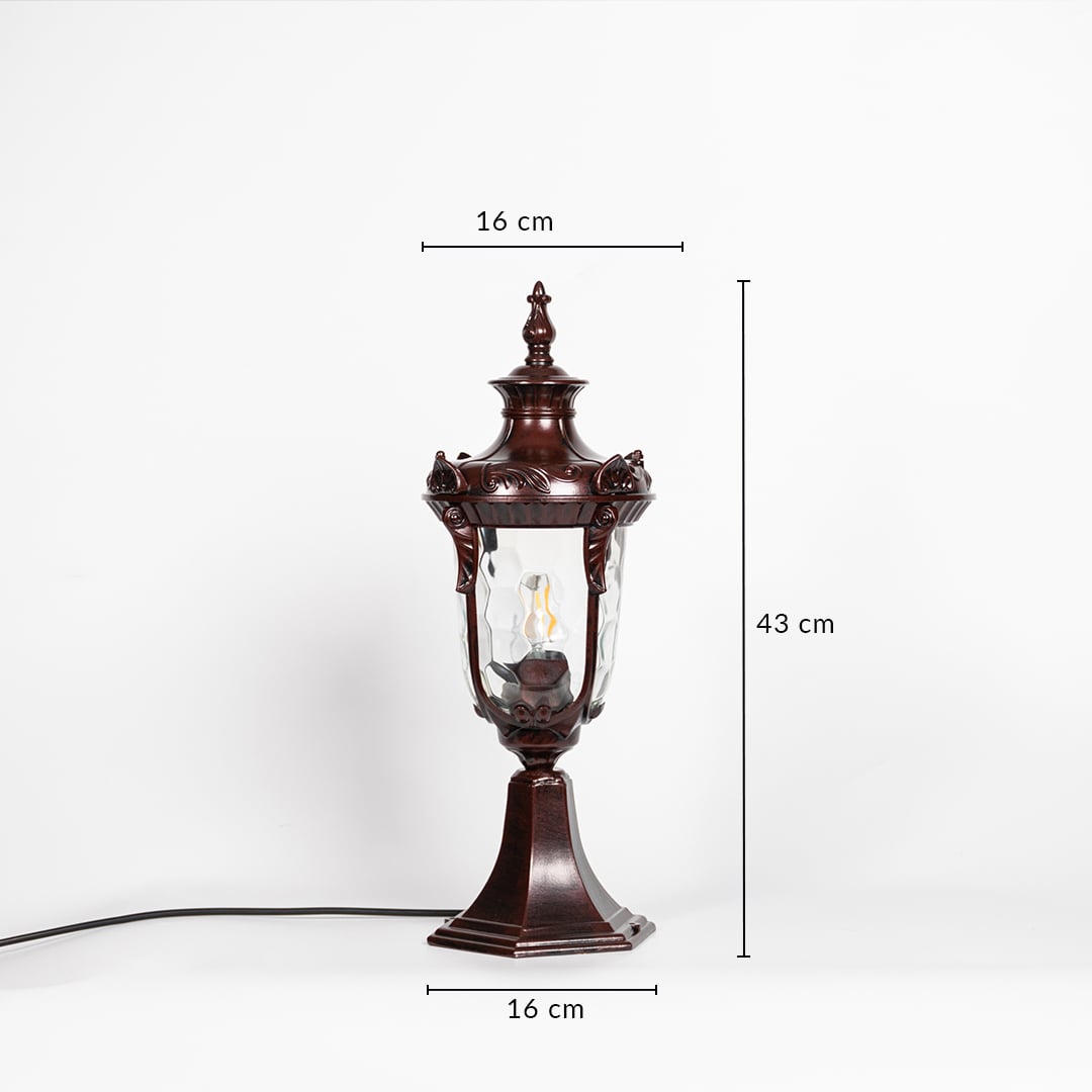 Antique brown pillar light with patterned clear glass measuring 43 cm height and 16 cm width ideal for outdoor pillar decor.