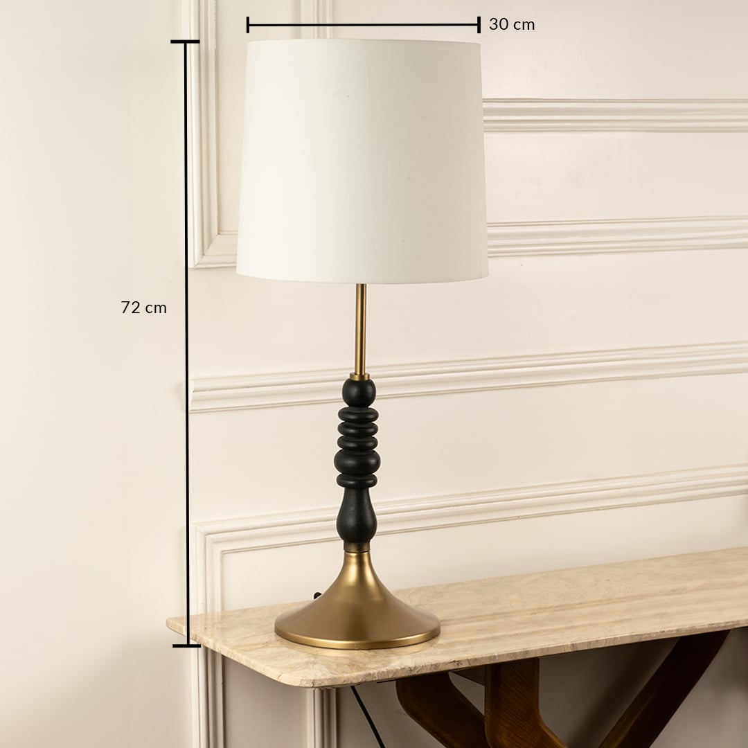 Brass metal table lamp with white fabric shade measuring 77 cm height and 30 cm width for elegant interiors.