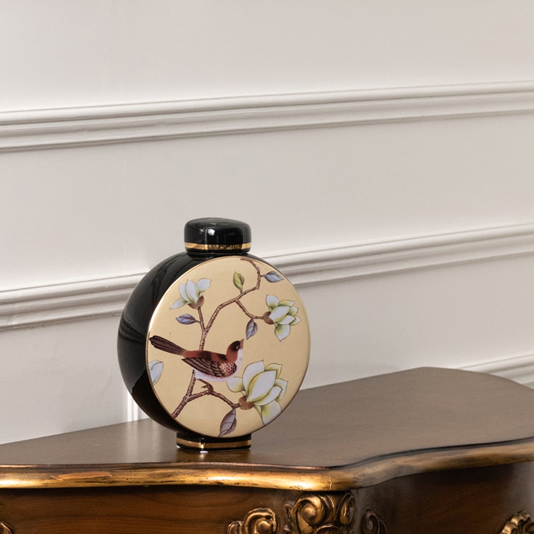 Round ceramic jar with cherry blossom artwork and size reference shown in a closeup view revealing handpainted floral details cultural charm and Japanese inspired décor for refined interiors.